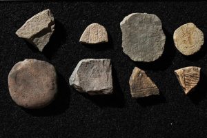 A collection of engraved stones (by Live Science)