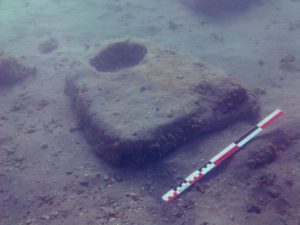 Limestone anchor found underwater (by Pierre Tallet via Haaretz)