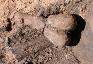 Clay figurine found in situ (by Mark Chenault via Western Digs)