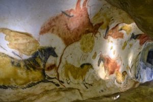 Numerous animals on walls of the Lascaux cave (by D Nidos, via International Business Times)