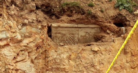 Road works unearth ancient sarcophagus