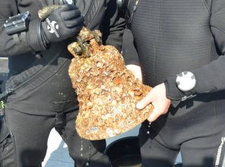 Bell of a destroyer escort vessel recovered after 75 years