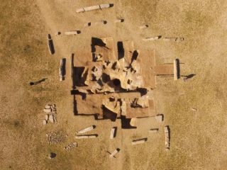 Monument surrounded by pillars discovered on steppe